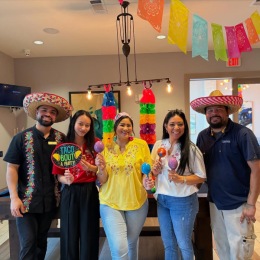 people celebrating with colorful decorations